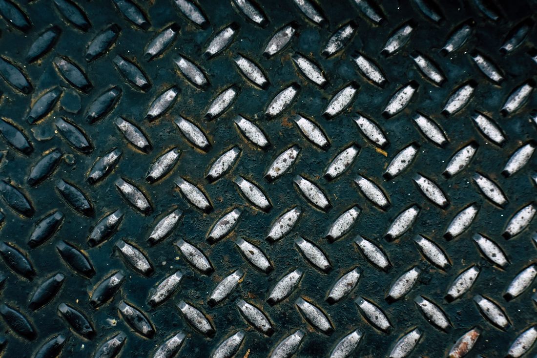 Close-up of diamond plate anti-slip metal surface